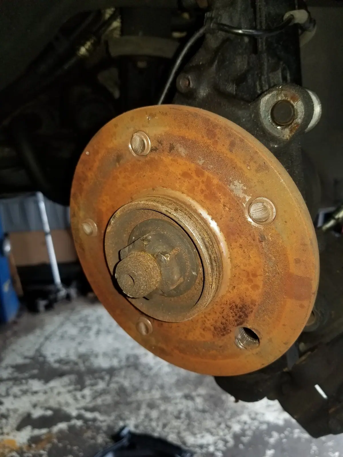 Rusted front hub with the brake rotor removed