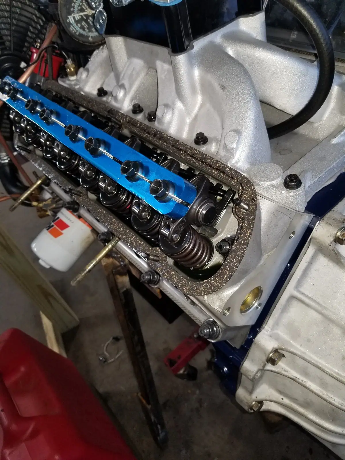 V8 with the valve cover off, showing rocker arms and valve springs