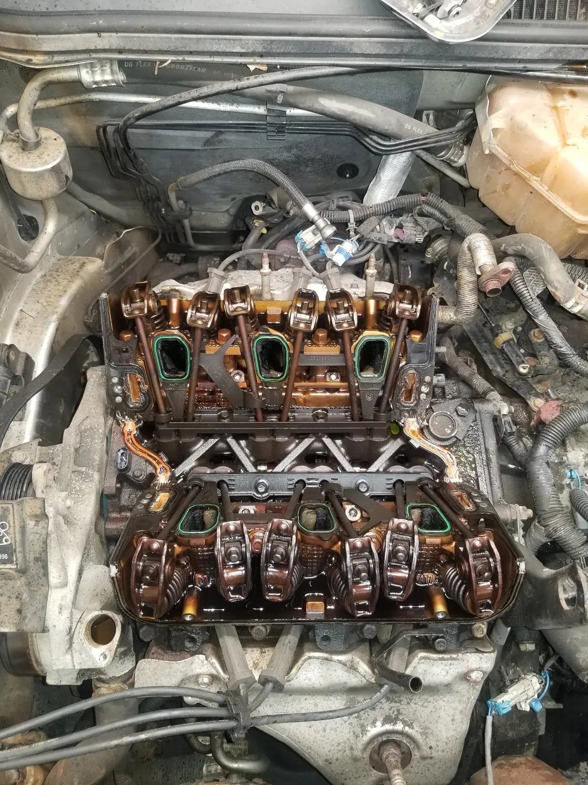 V6 with the intake manifold off and the pushrods exposed